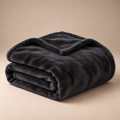 Folded black Warmora plush heated blanket